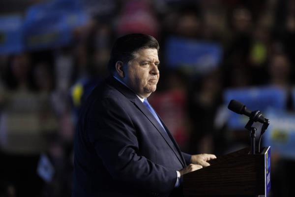 Gov. J.B. Pritzker speaks with attendees after declaring victory on election night at a rally at the Marriott Marquis Chicago hotel on Nov. 8, 2022. He was challenged by Republican state Sen. Darren Bailey. 