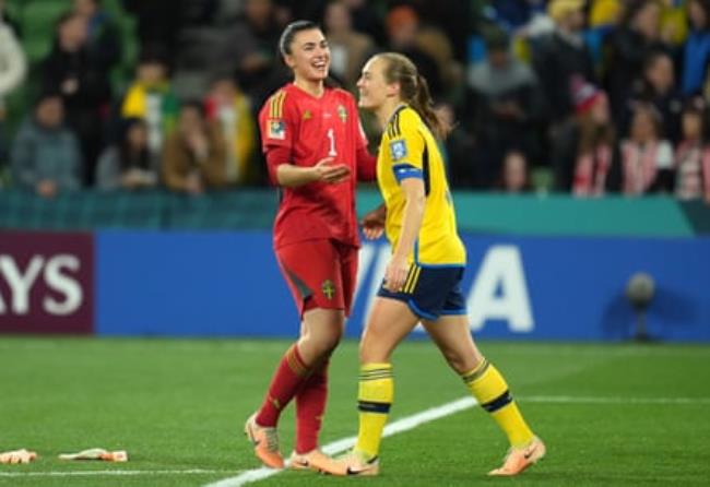 Zecira Musovic celebrates with Magdalena Eriksson after beating USA in a penalty shootout.